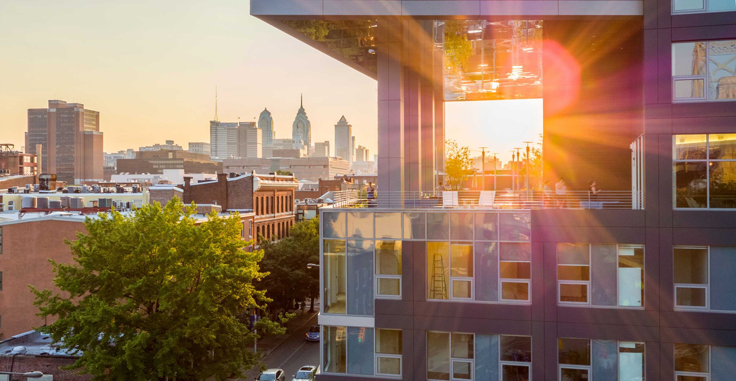 Sunny-view-of-Bridge-on-Race-patio-with-city-skyline-in-background-scaled.jpg